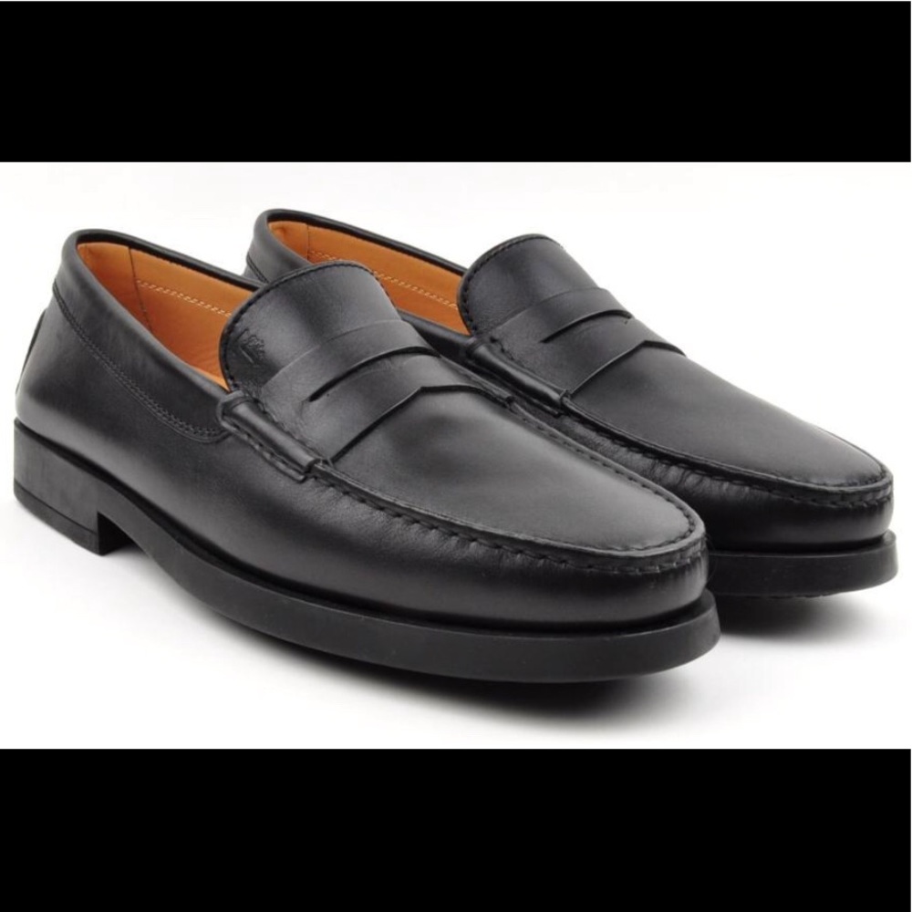 Like new black Tod’s dress shoes